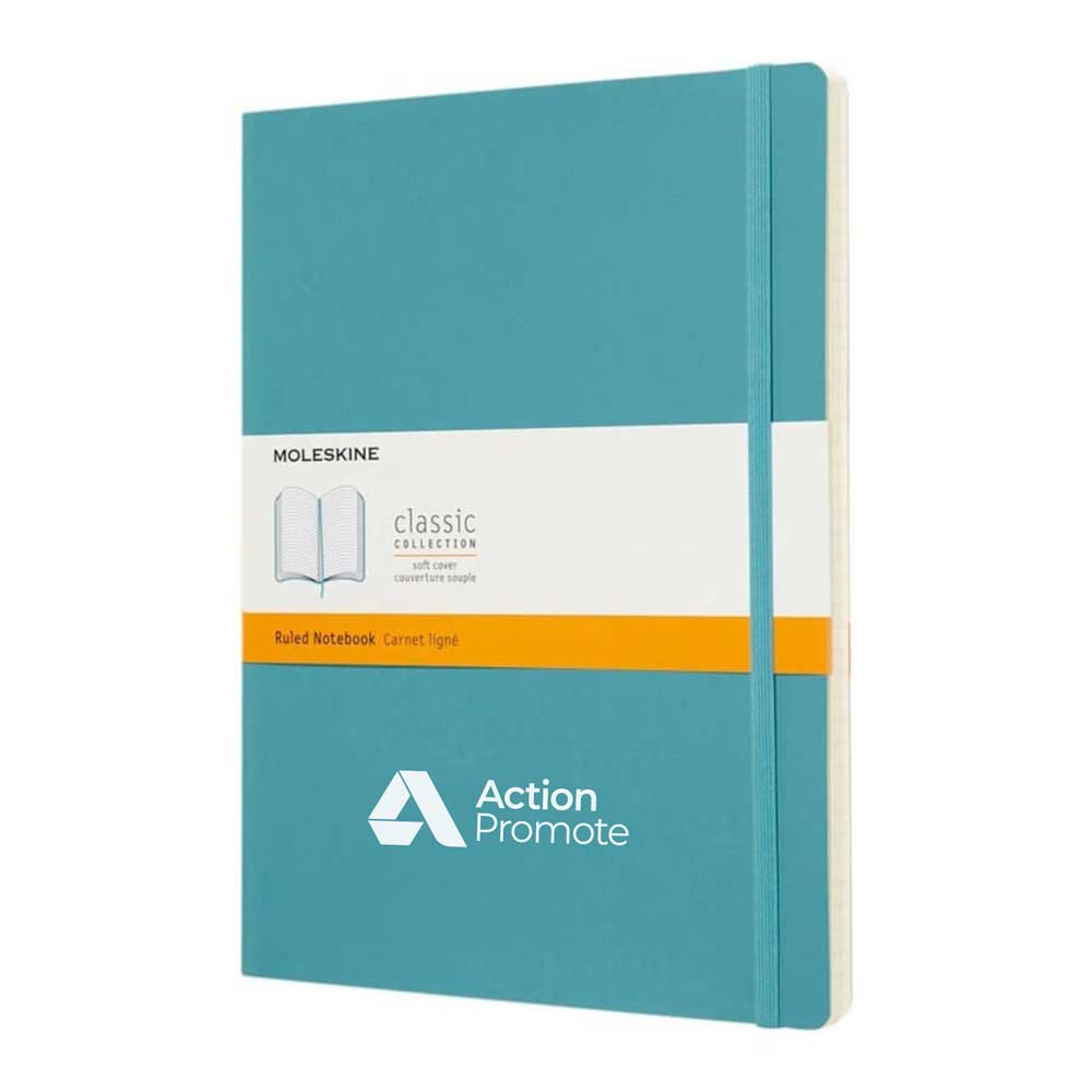 vibrant blue rounded edge Moleskine notebook featuring a branded band that reads ‘Ruled Notebook’ in English and ‘Carnet ligne’ in French.
